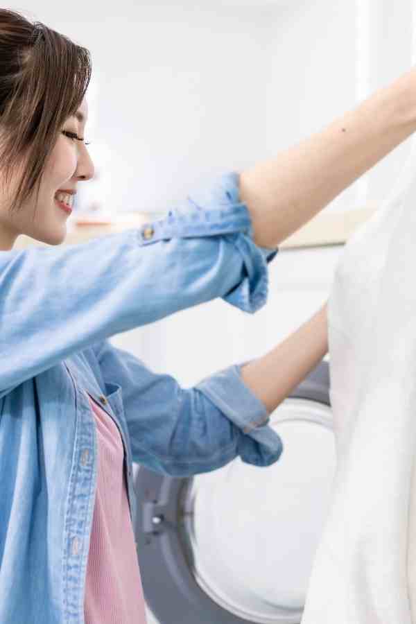 woman doing laundry at home